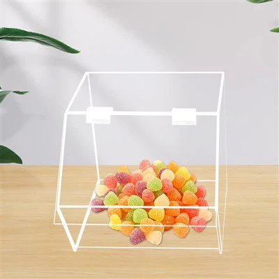 Išvalyti akrilo saldainiai, grūdai, riešutų dėžutė